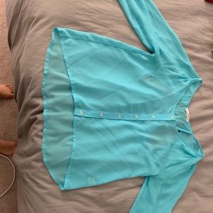 Blue blouse with cut outs in the back